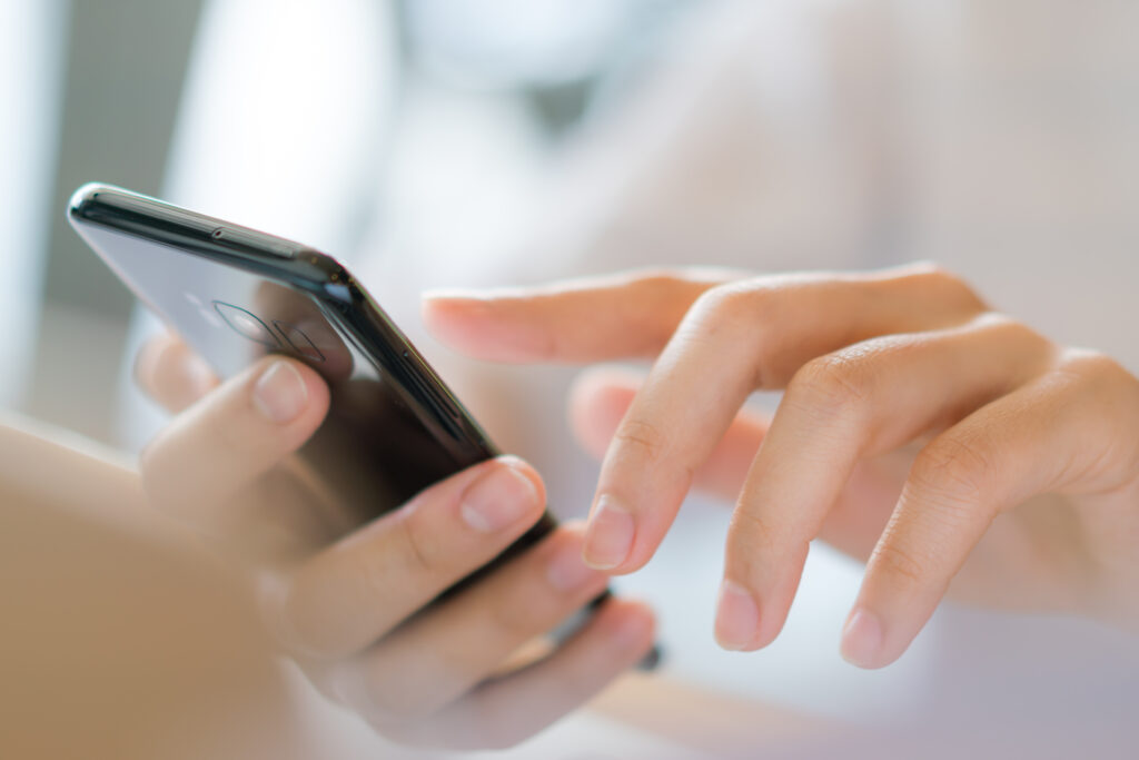 Contact 1 business hand with mobile phone